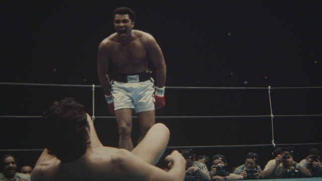 74. col pic of Ali Shouting at apponent on the floor