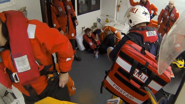Service to person with crushed foot (photo by Callum Robinson)