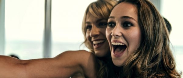 Scene 25; INT Restaurant; Laura (Alycia Debnam - Carey) is sitting with her friends celebrating her birthday.