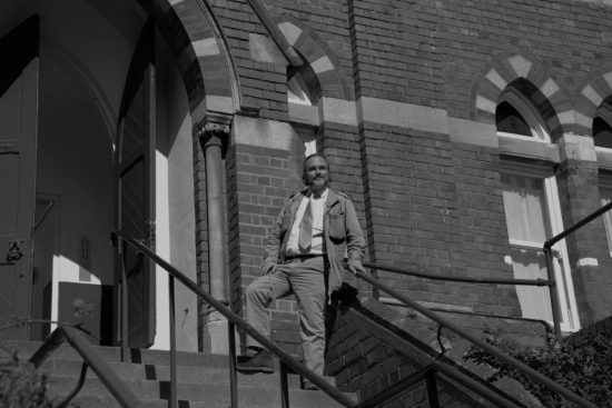 Dr. Balden Cross outside the PMRI Headquarters.