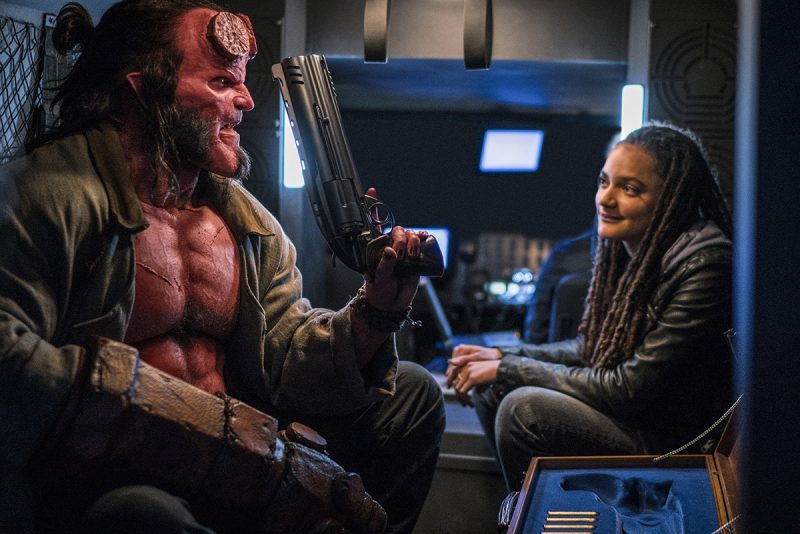David Harbour as 'Hellboy' and Sasha Lane as 'Alice Monoghan' in HELLBOY. Photo Credit: Mark Rogers.