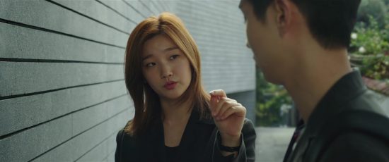 Woo-sik Choi and So-dam Park in Parasite (2019)