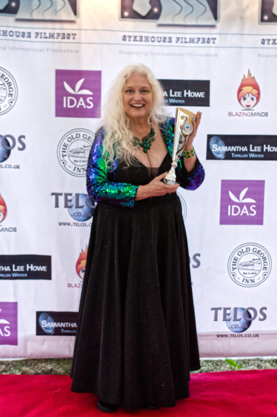 Taunya Gren with her award for Best Short Film