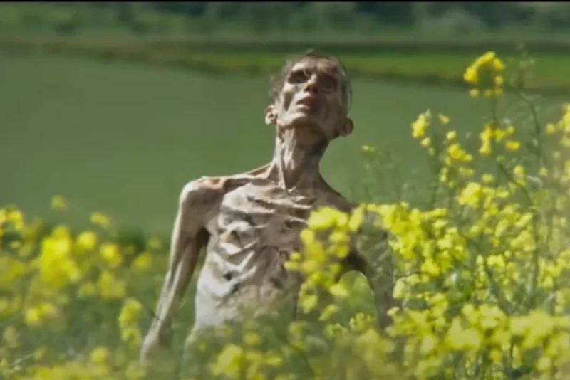 Angus Neill as ‘Emaciated Infected’